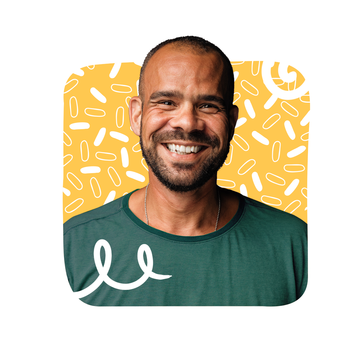 A headshot of a man with a beard, wearing a green shirt, and smiling.